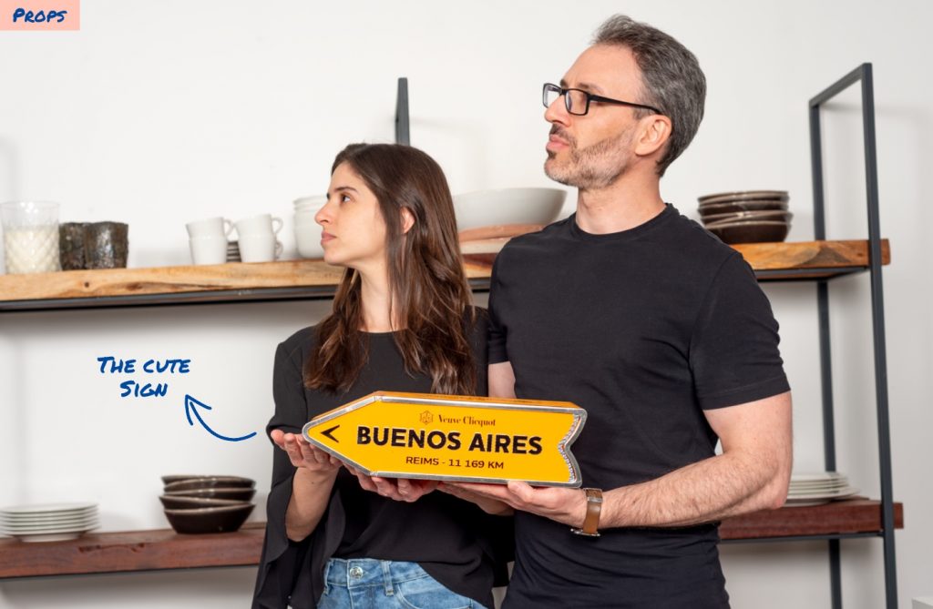A photo with a yellow sign being used as prop